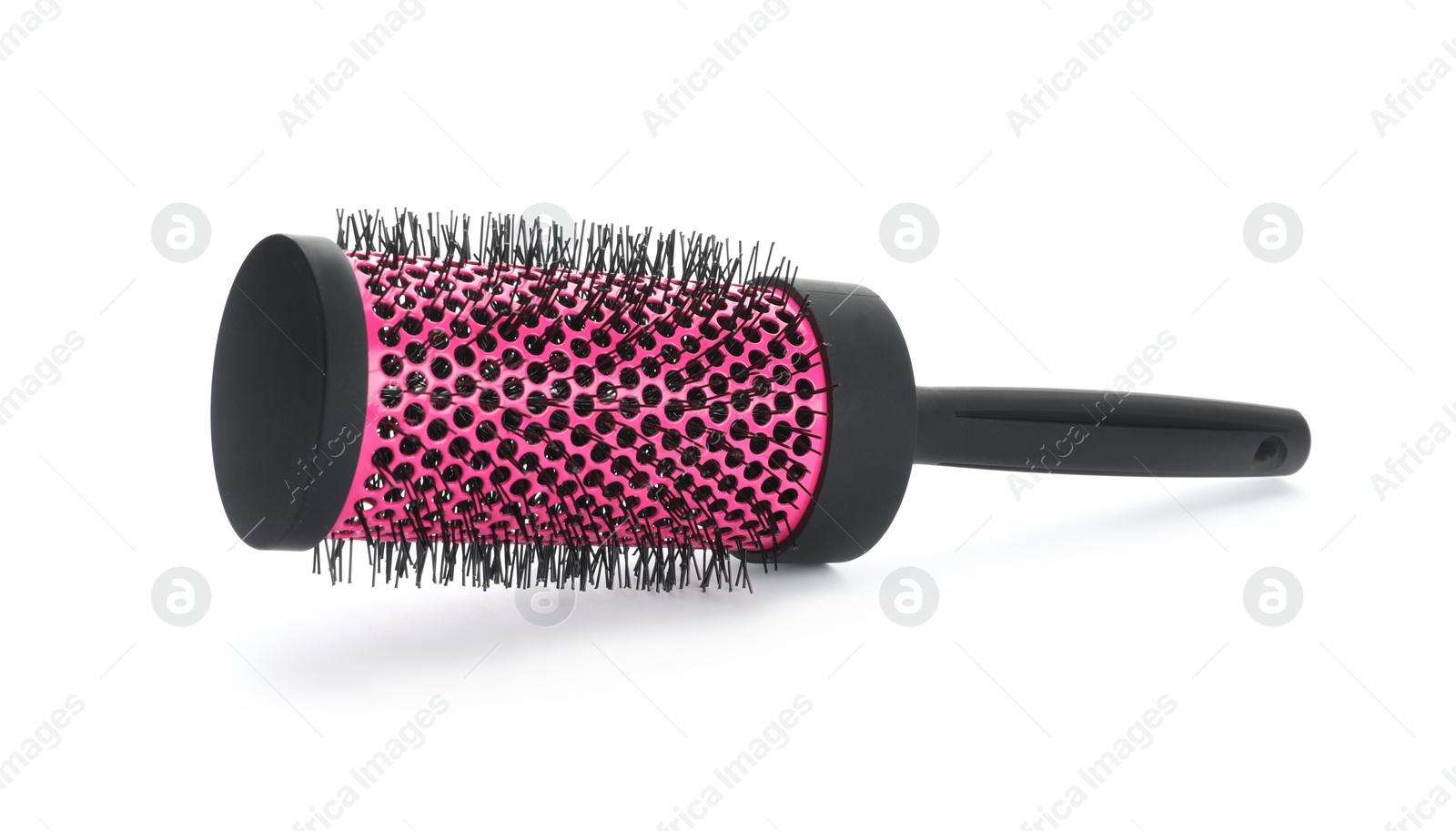 Photo of New round hair brush isolated on white