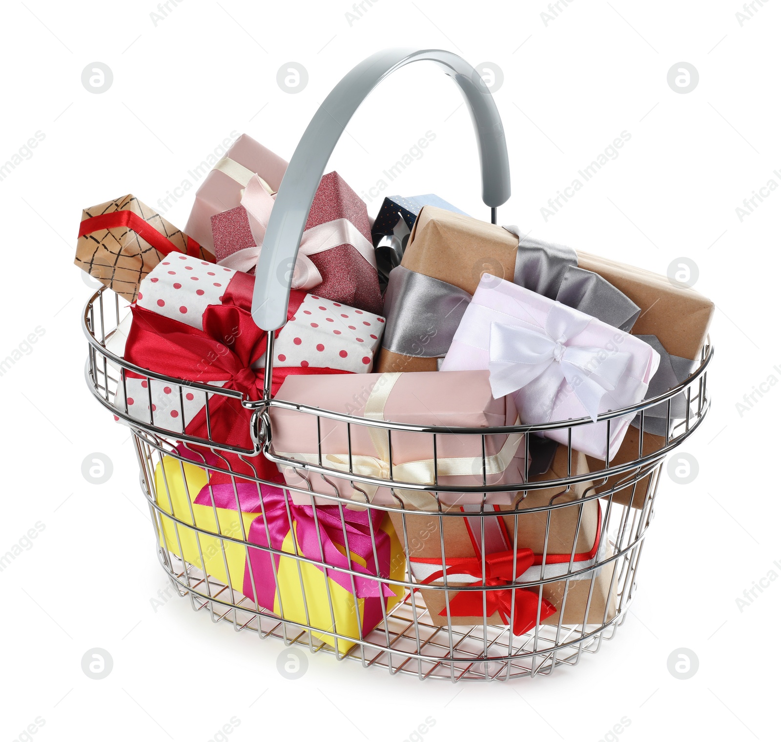 Photo of Shopping basket full of gift boxes on white background