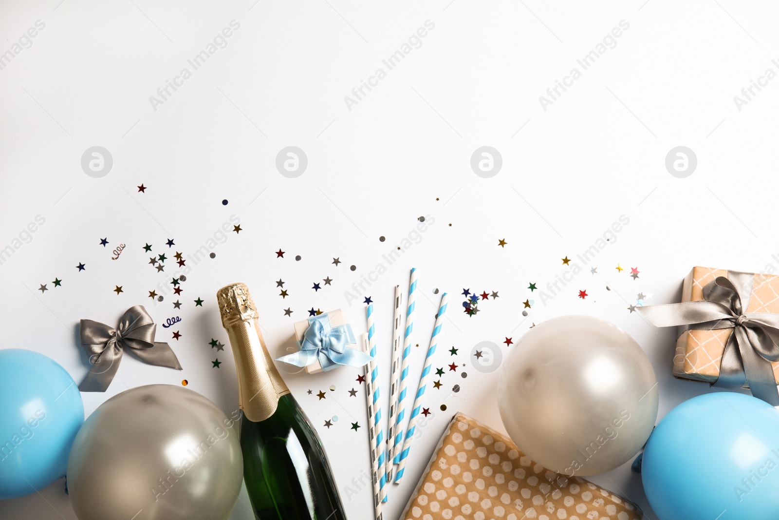 Photo of Creative flat lay composition with bottle of champagne and space for text on color background