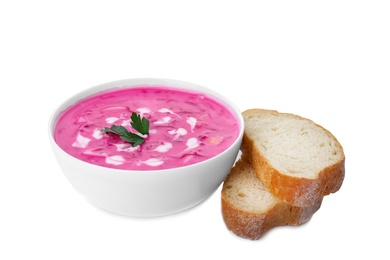 Photo of Delicious cold summer beet soup and bread on white background