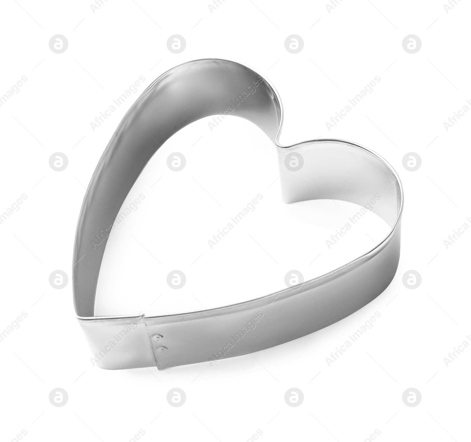 Photo of Heart shaped cookie cutter on white background