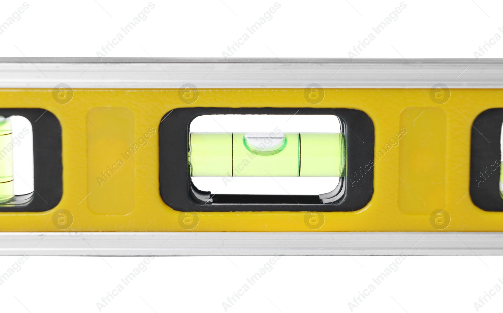 Photo of Yellow building level isolated on white. Construction tool