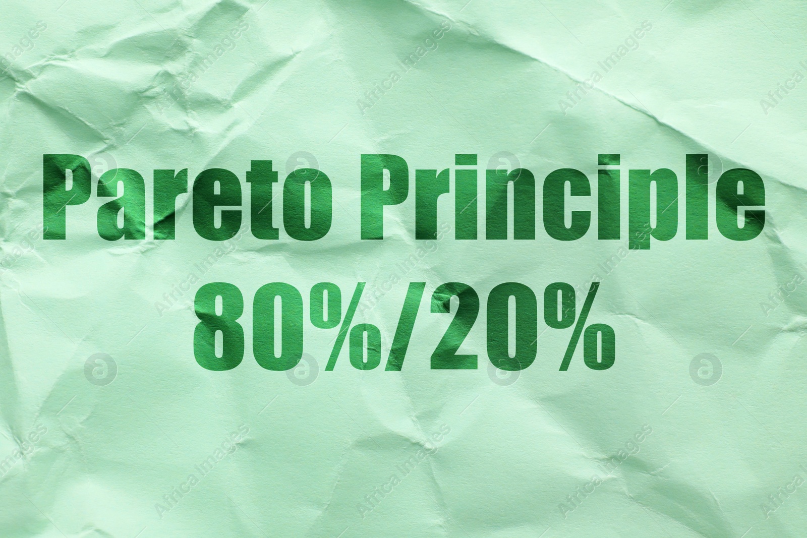 Image of Text PARETO PRINCIPLE 80%/20% on green paper background