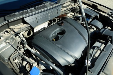 Car engine in modern auto, above view