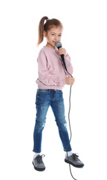 Photo of Cute funny girl with microphone on white background