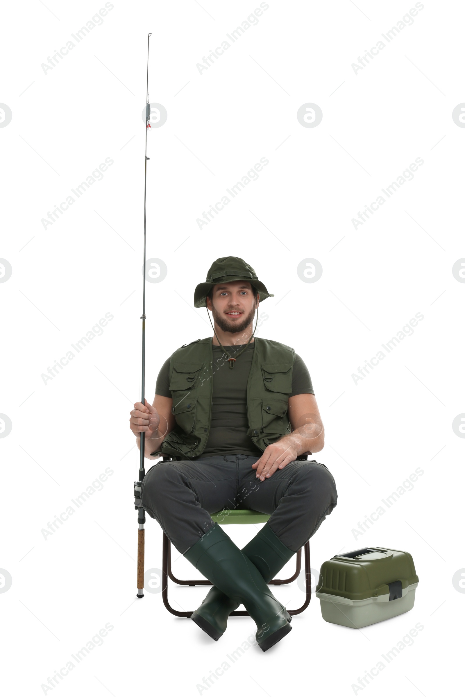 Photo of Fisherman with rod and tackle box on chair isolated on white