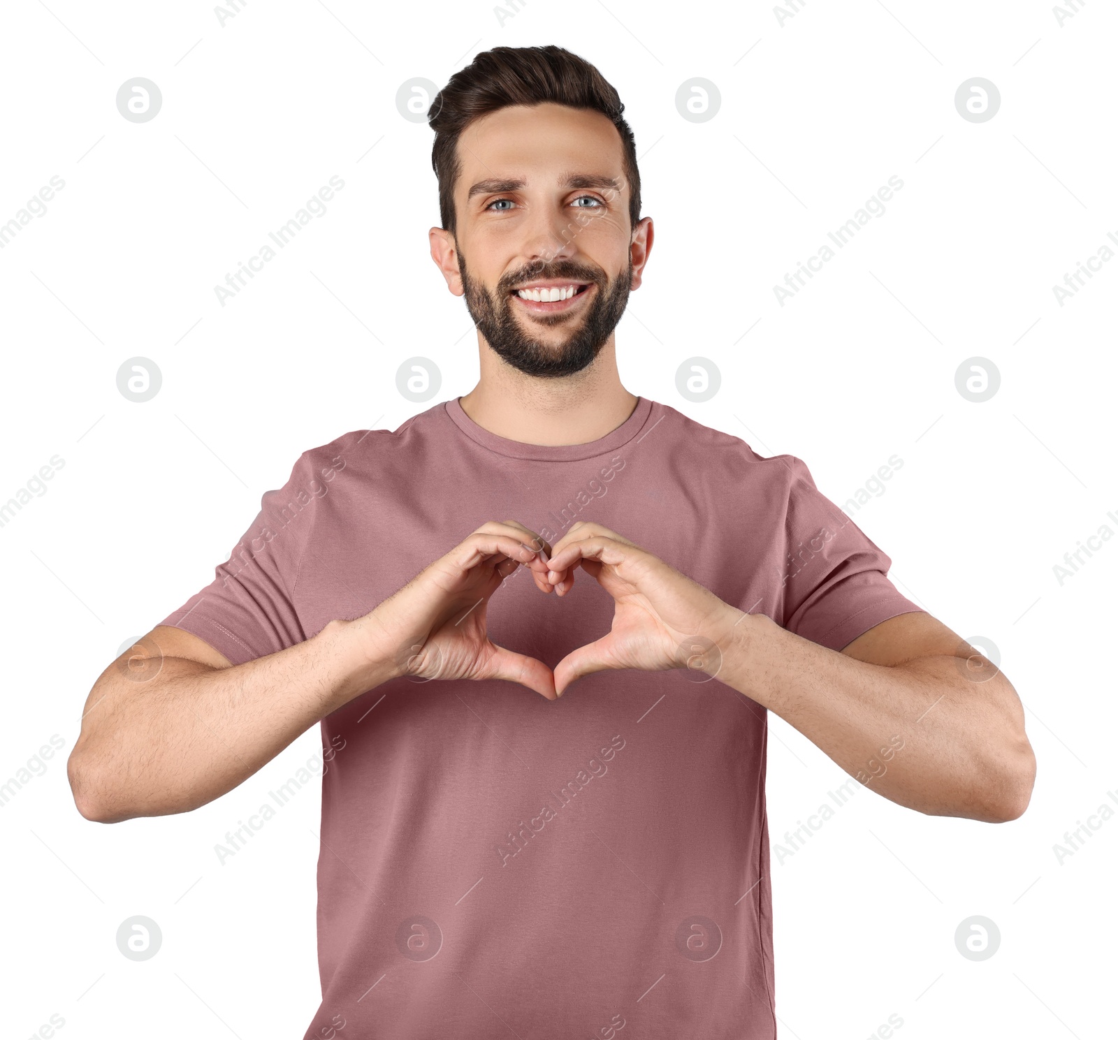 Photo of Happy man making heart with hands on white background