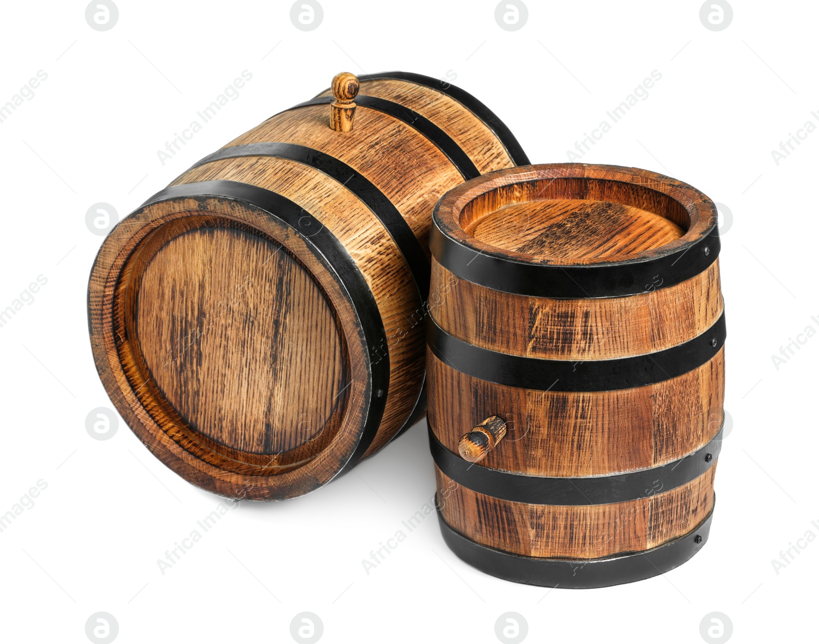 Photo of Two traditional wooden barrels isolated on white