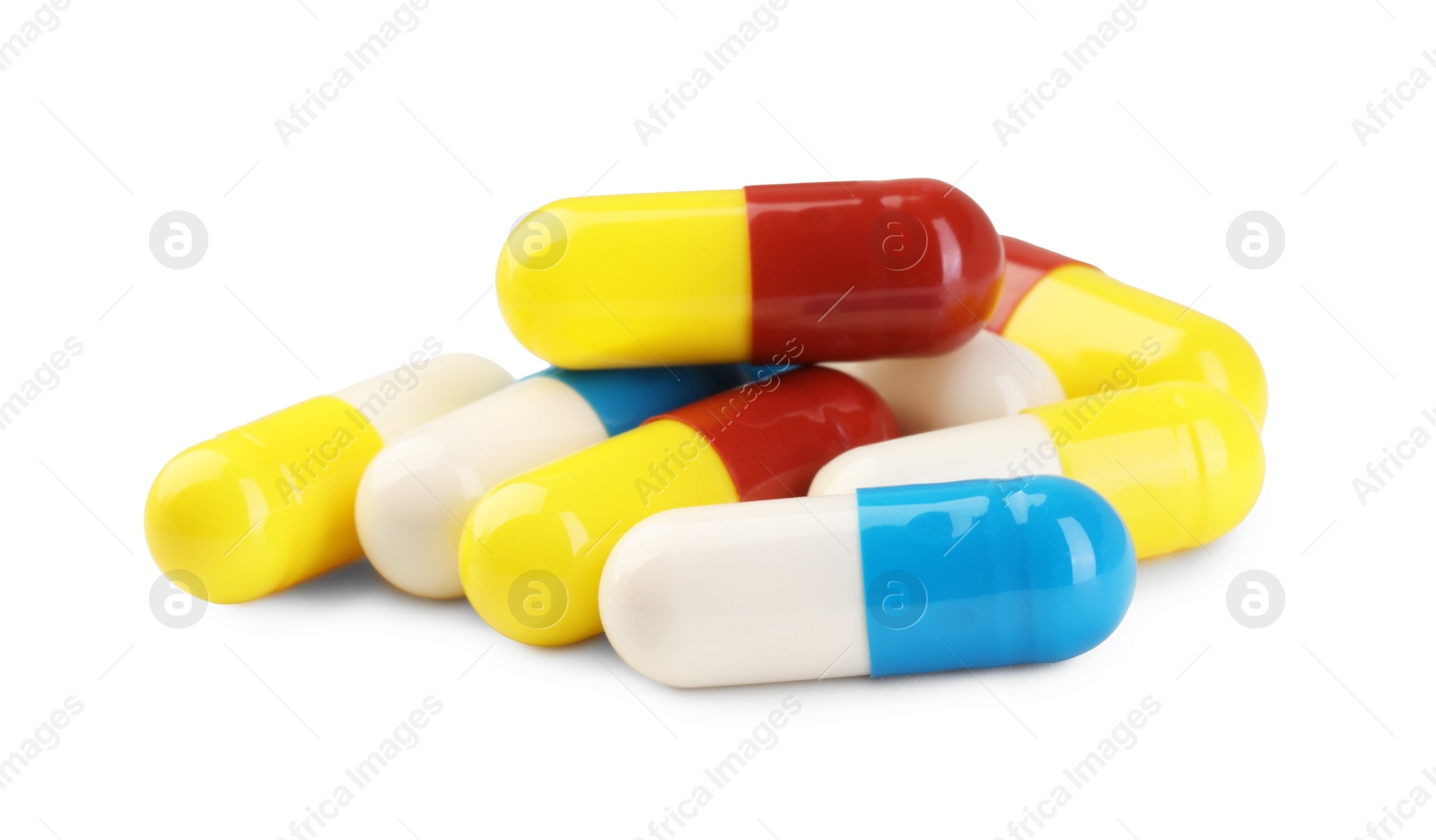 Photo of Many antibiotic pills isolated on white. Medicinal treatment