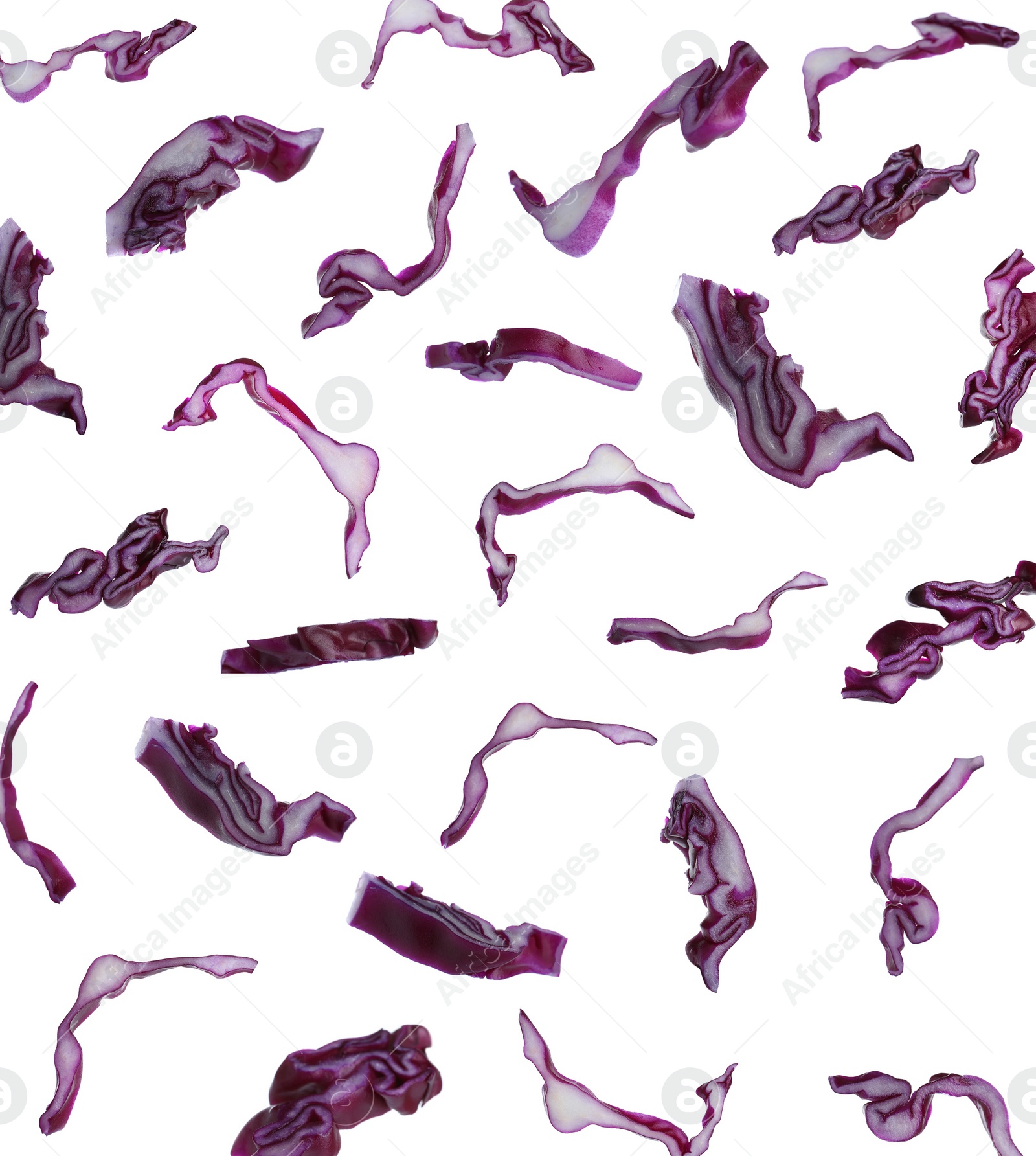 Image of Set with falling fresh pieces of red cabbage on white background