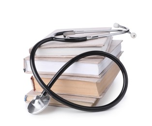 Stack of student textbooks and stethoscope on white background. Medical education