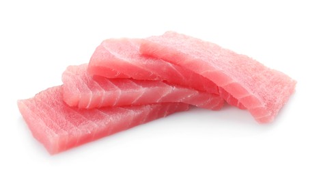 Tasty sashimi (pieces of fresh raw tuna) on white background