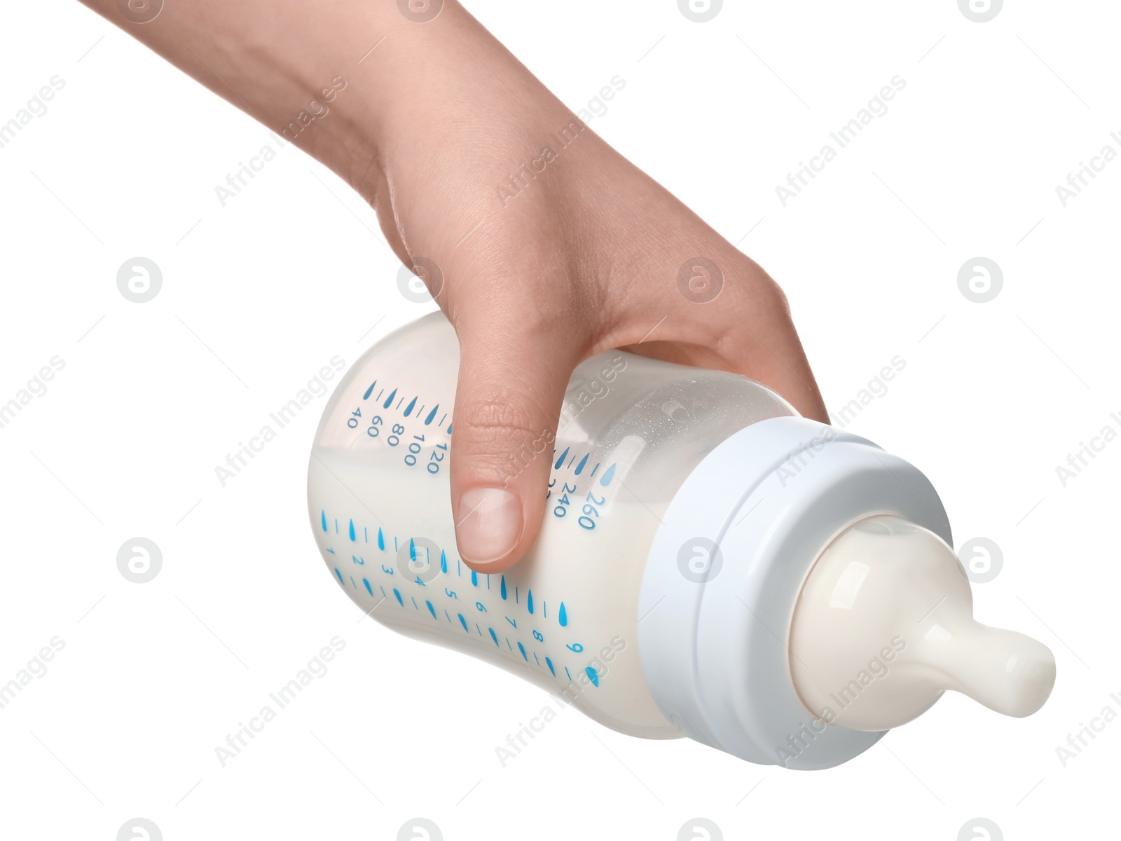 Photo of Woman holding feeding bottle with infant formula on white background, closeup