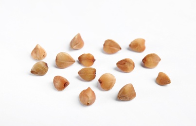 Uncooked buckwheat on white background. Healthy diet