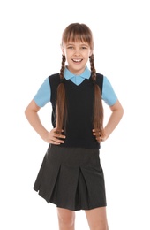 Photo of Portrait of cute girl in school uniform on white background