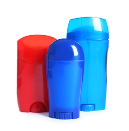 Photo of Different colorful deodorants on white background