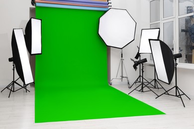 Chroma key compositing. Green backdrop and equipment in studio