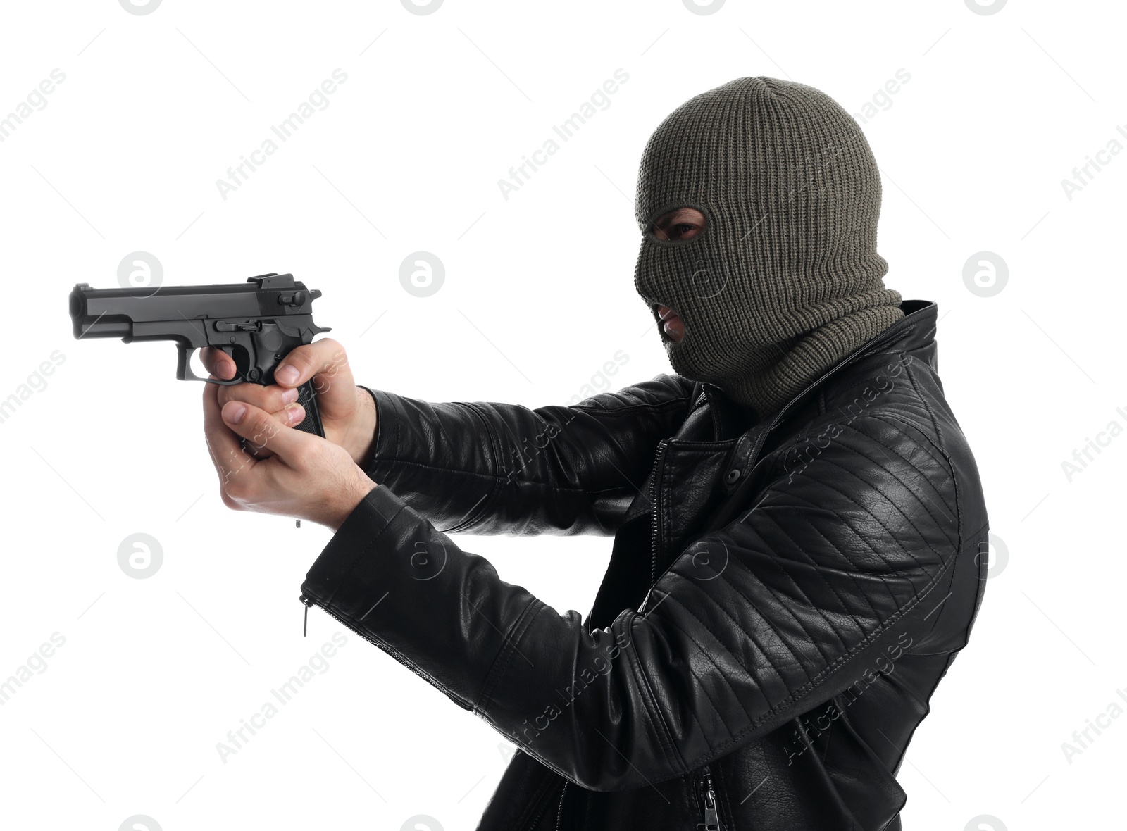 Photo of Man wearing knitted balaclava with gun on white background