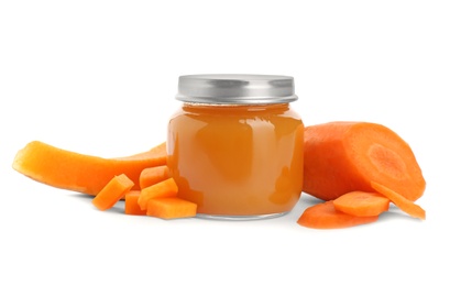 Jar with healthy baby food, carrot and pumpkin on white background