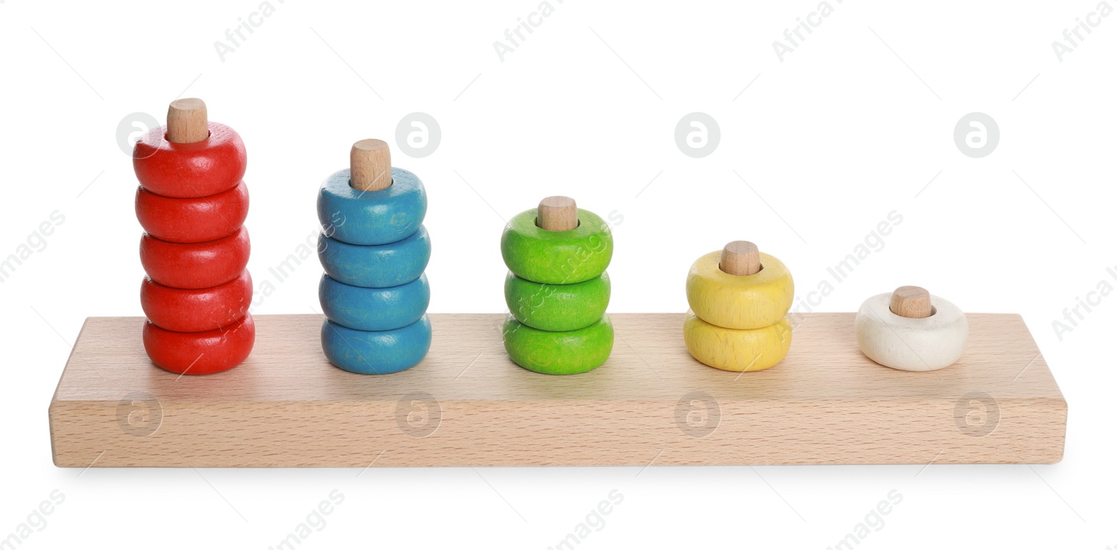 Photo of Stacking and counting game wooden pieces isolated on white. Educational toy for motor skills development