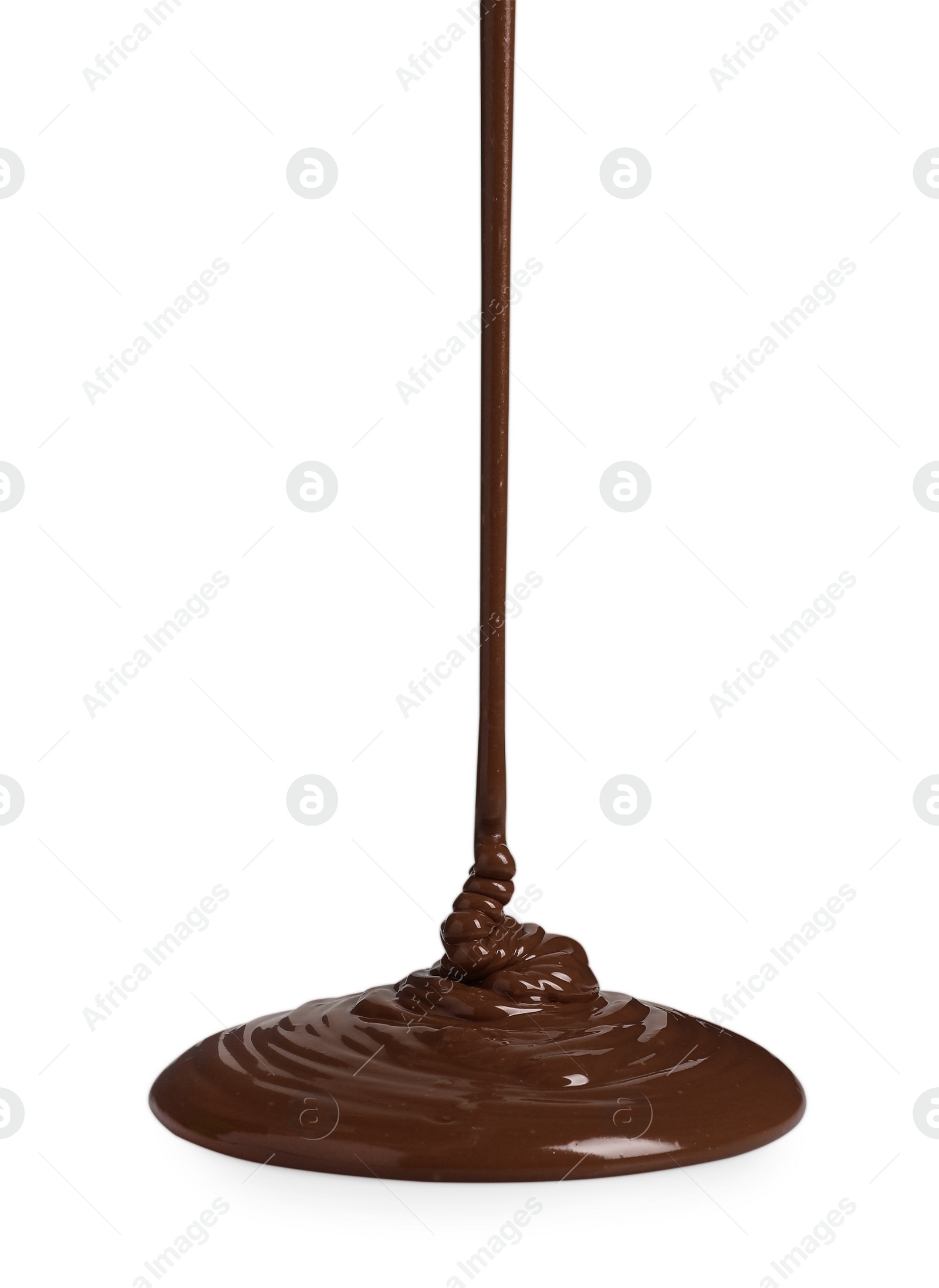 Photo of Pouring tasty melted milk chocolate isolated on white