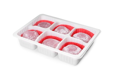 Photo of Delicious mochi in plastic tray on white background. Traditional Japanese dessert