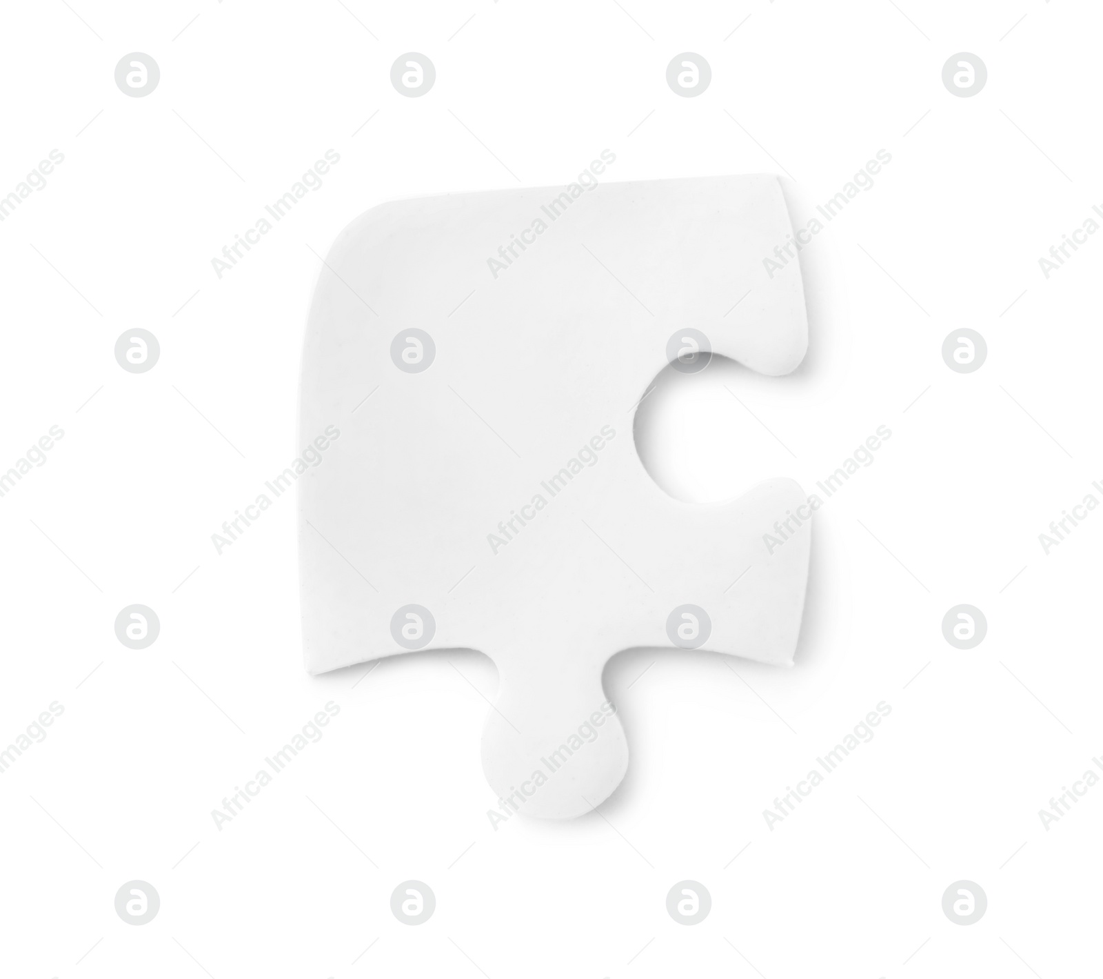 Photo of Blank puzzle piece isolated on white, top view