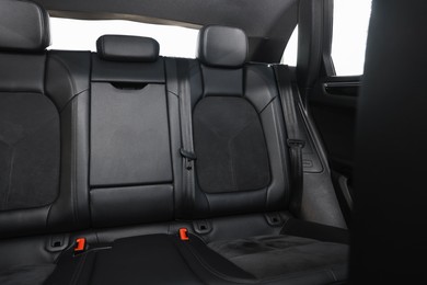 Photo of Clean leather seats inside of modern black car