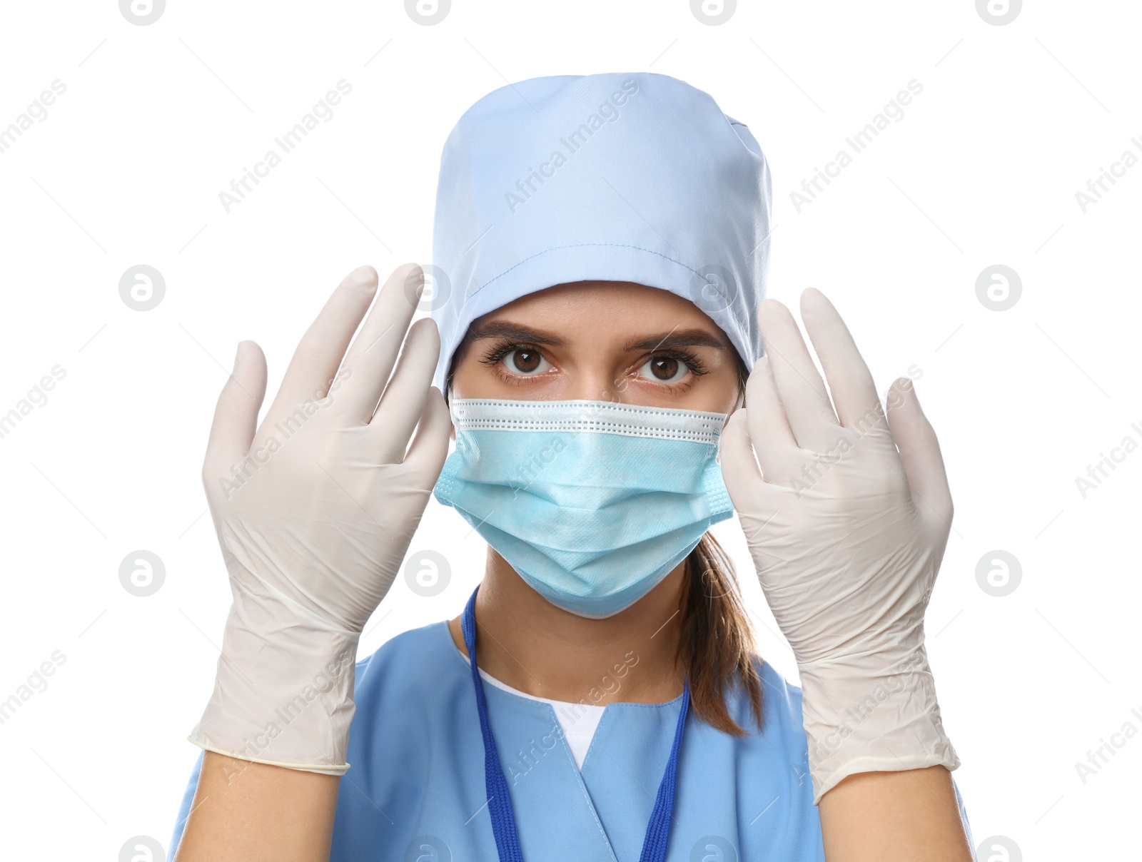 Photo of Doctor in medical gloves, protective mask and scrubs on white background