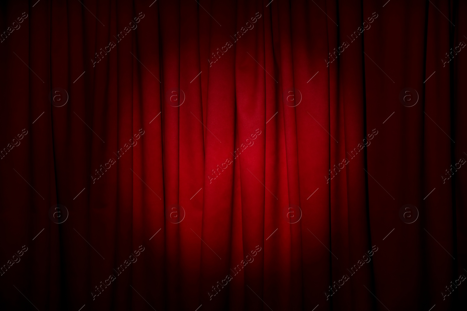 Photo of Closed elegant red front curtains as background