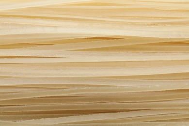 Closeup view of dried rice noodles as background