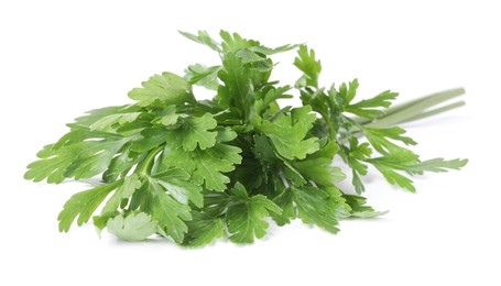 Photo of Sprigs of fresh green parsley leaves isolated on white