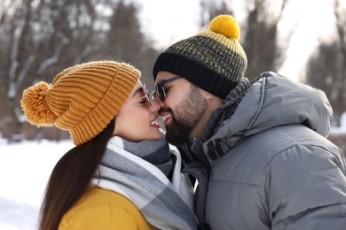 Beautiful happy couple spending time together on winter day