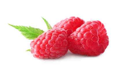 Photo of Fresh ripe raspberries with leaves isolated on white
