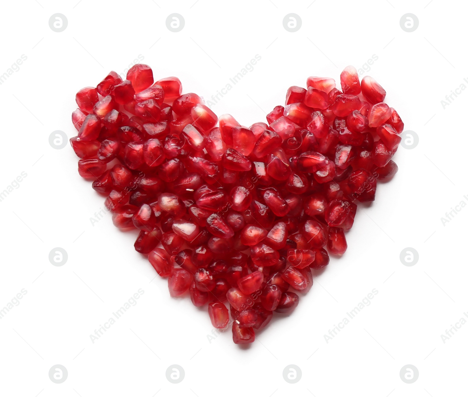 Photo of Heart made of pomegranate seeds on white background, top view with space for text