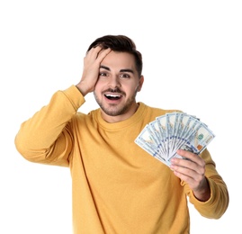 Photo of Excited young man with money on white background