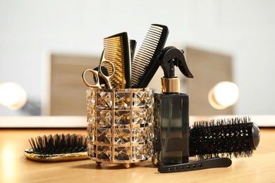 Set of hairdresser tools on table in salon