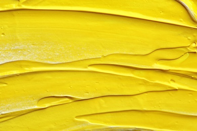 Photo of Bright paint strokes drawn with brush as abstract background