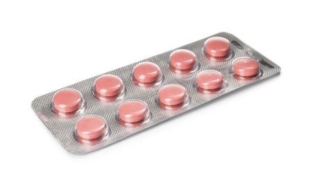 Photo of Pills in blister pack on white background. Medical treatment