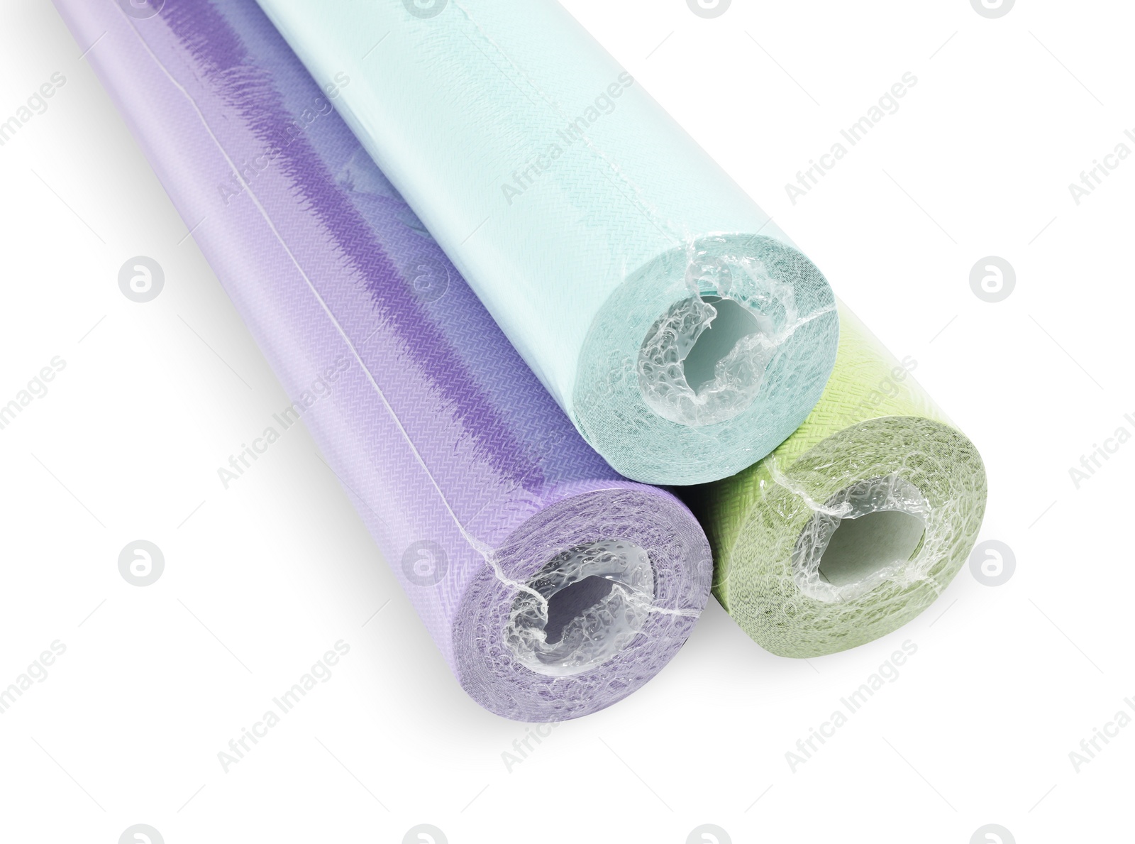 Photo of Three colorful wallpaper rolls isolated on white