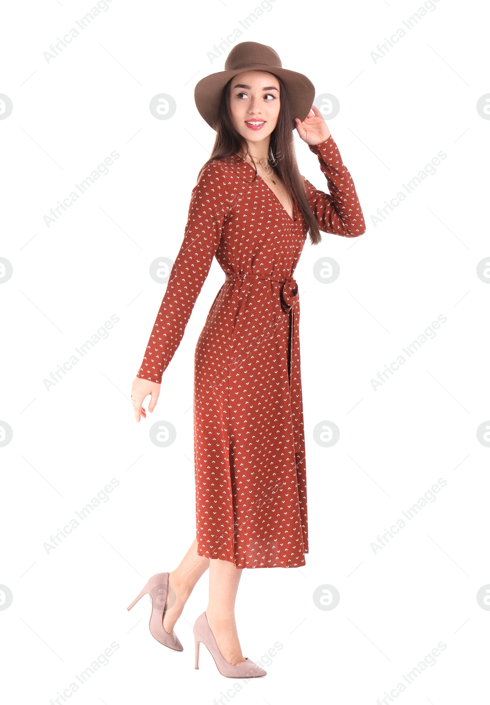 Photo of Portrait of beautiful young woman in stylish dress on white background