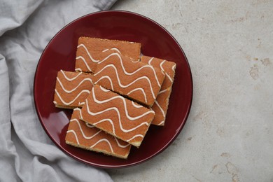 Photo of Tasty sponge cakes on light grey table, top view. Space for text