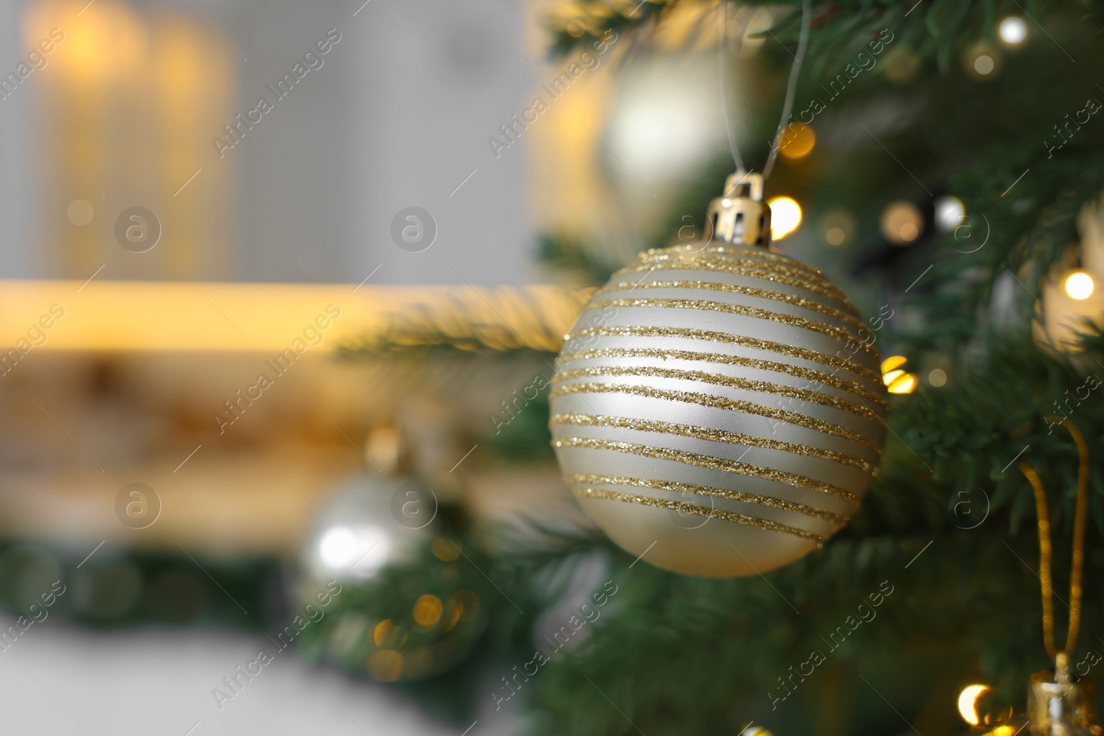 Photo of Closeup view of beautiful decorated Christmas tree indoors. Space for text