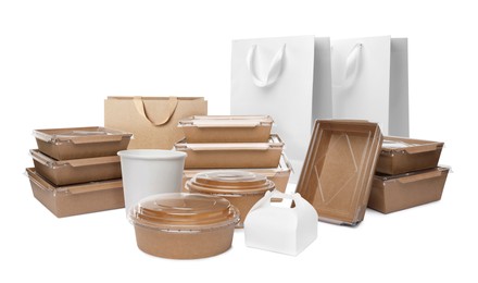 Image of Set with different paper bags and containers for food on white background