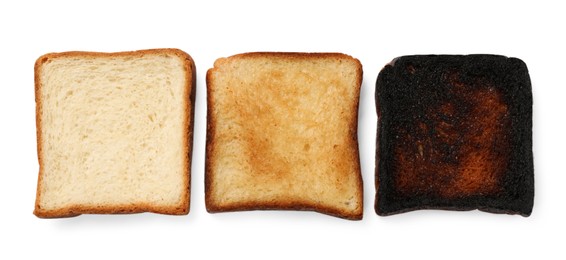 Photo of Toasting doneness. Bread slices of different shades isolated on white, top view