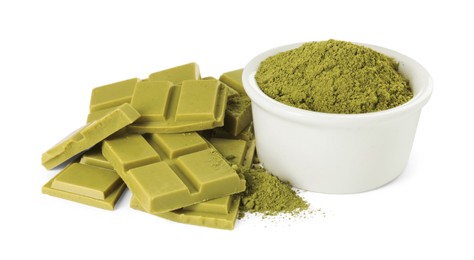 Photo of Pieces of tasty matcha chocolate bar and powder isolated on white