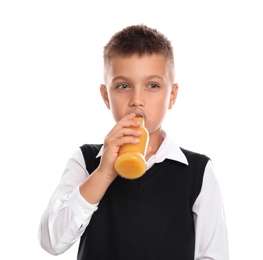 Photo of Little boy drinking juice on white background