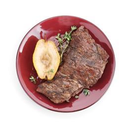 Photo of Delicious roasted beef meat, caramelized pear and thyme isolated on white, top view