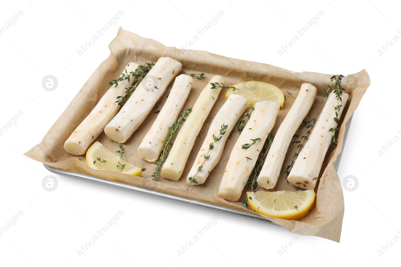 Photo of Baking tray with raw salsify roots, lemon and thyme isolated on white