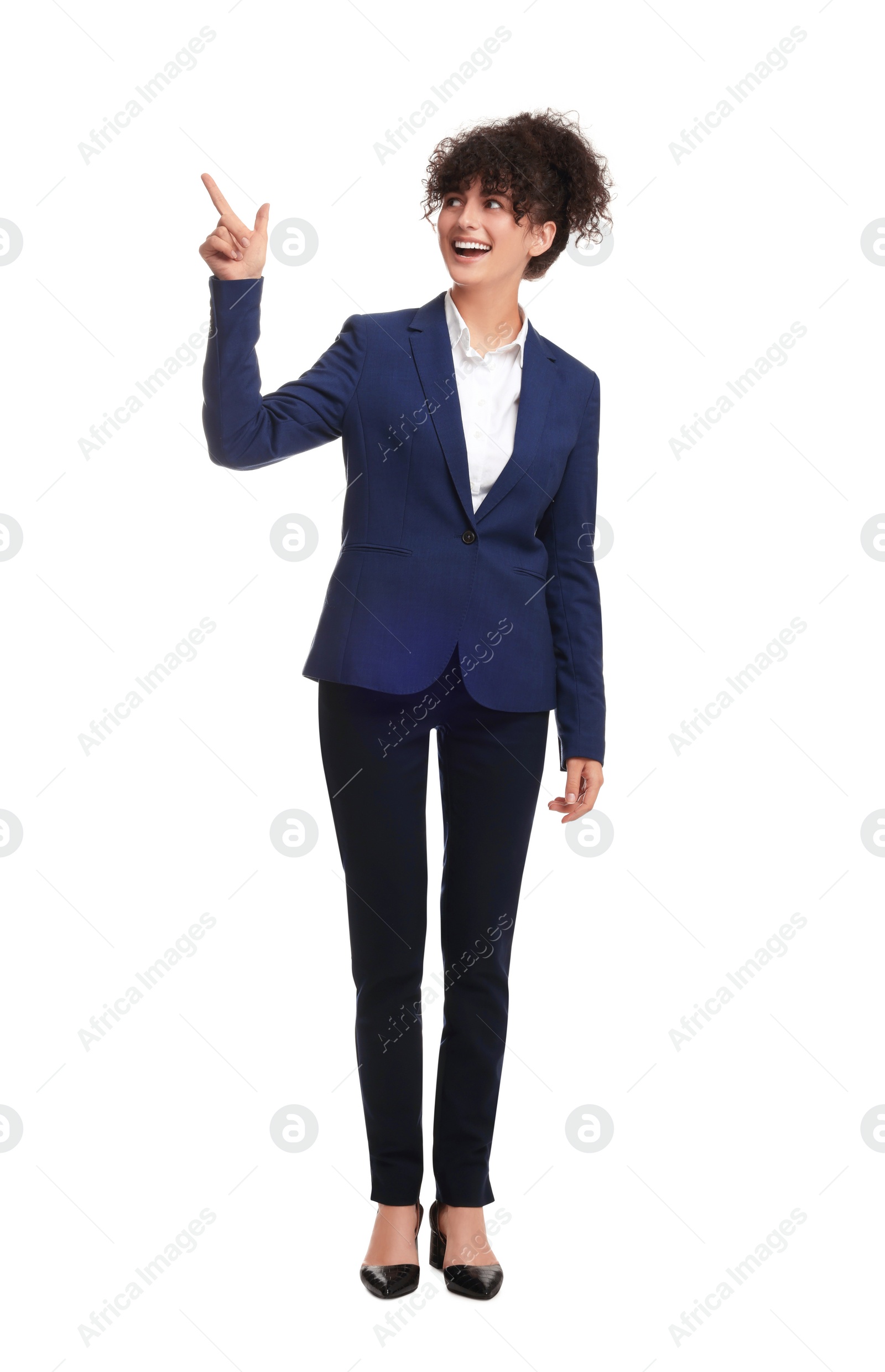 Photo of Beautiful businesswoman in suit pointing at something on white background